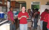 Serving the children their Christmas Dinner